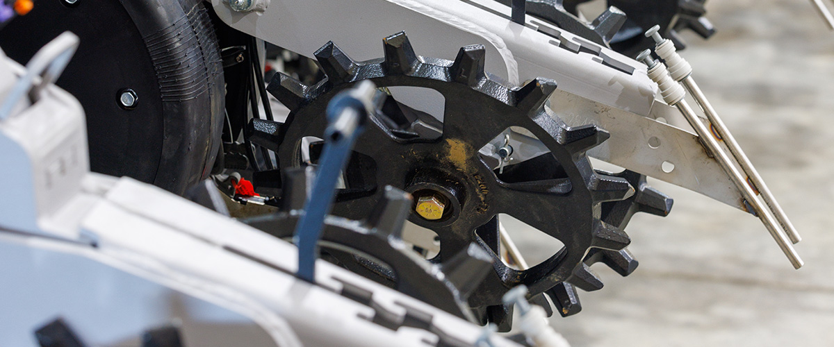 close up of a Yetter spiked closing wheel