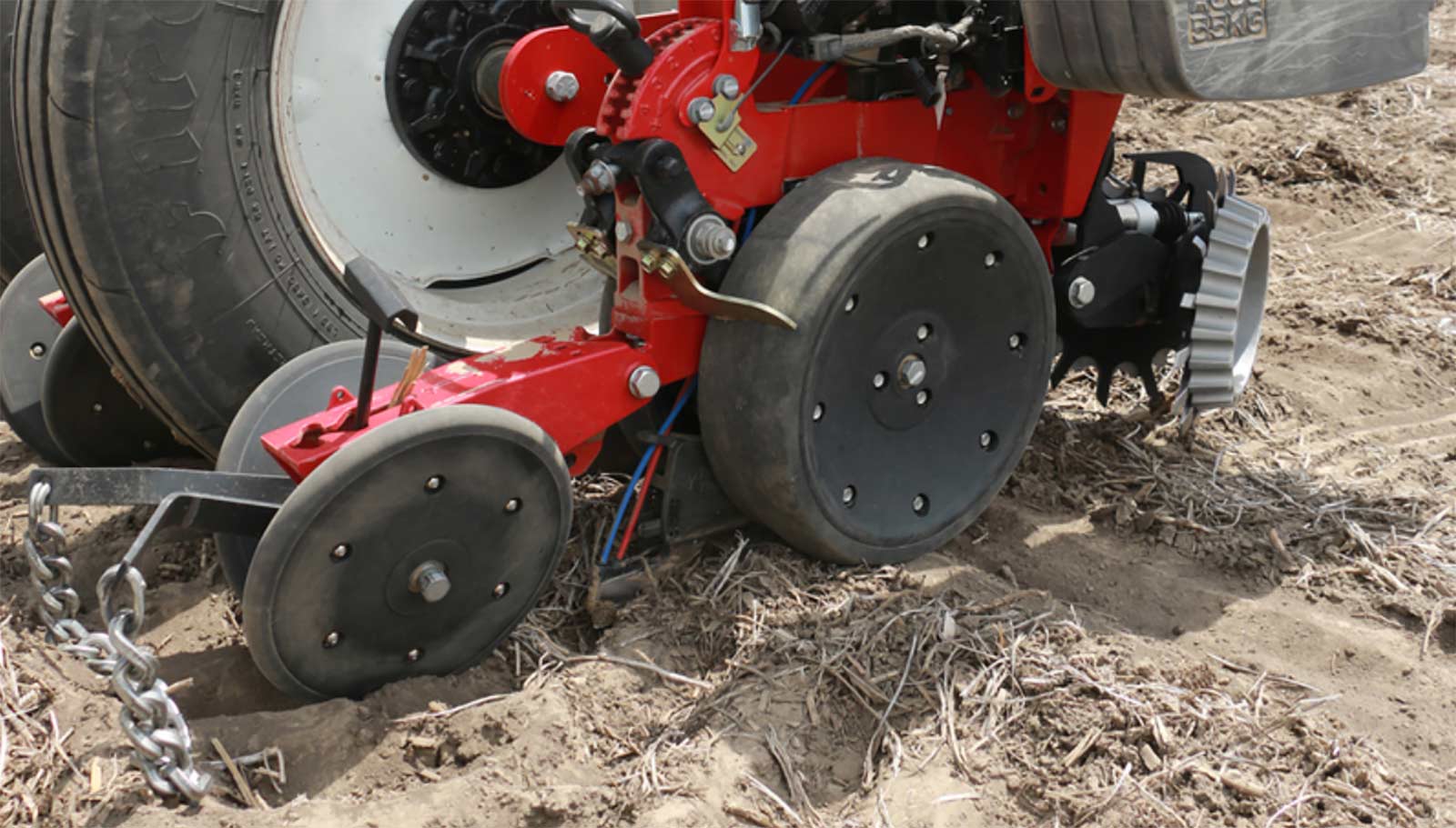 Precision Planting FurrowJet equipment item installed on a planter row unit