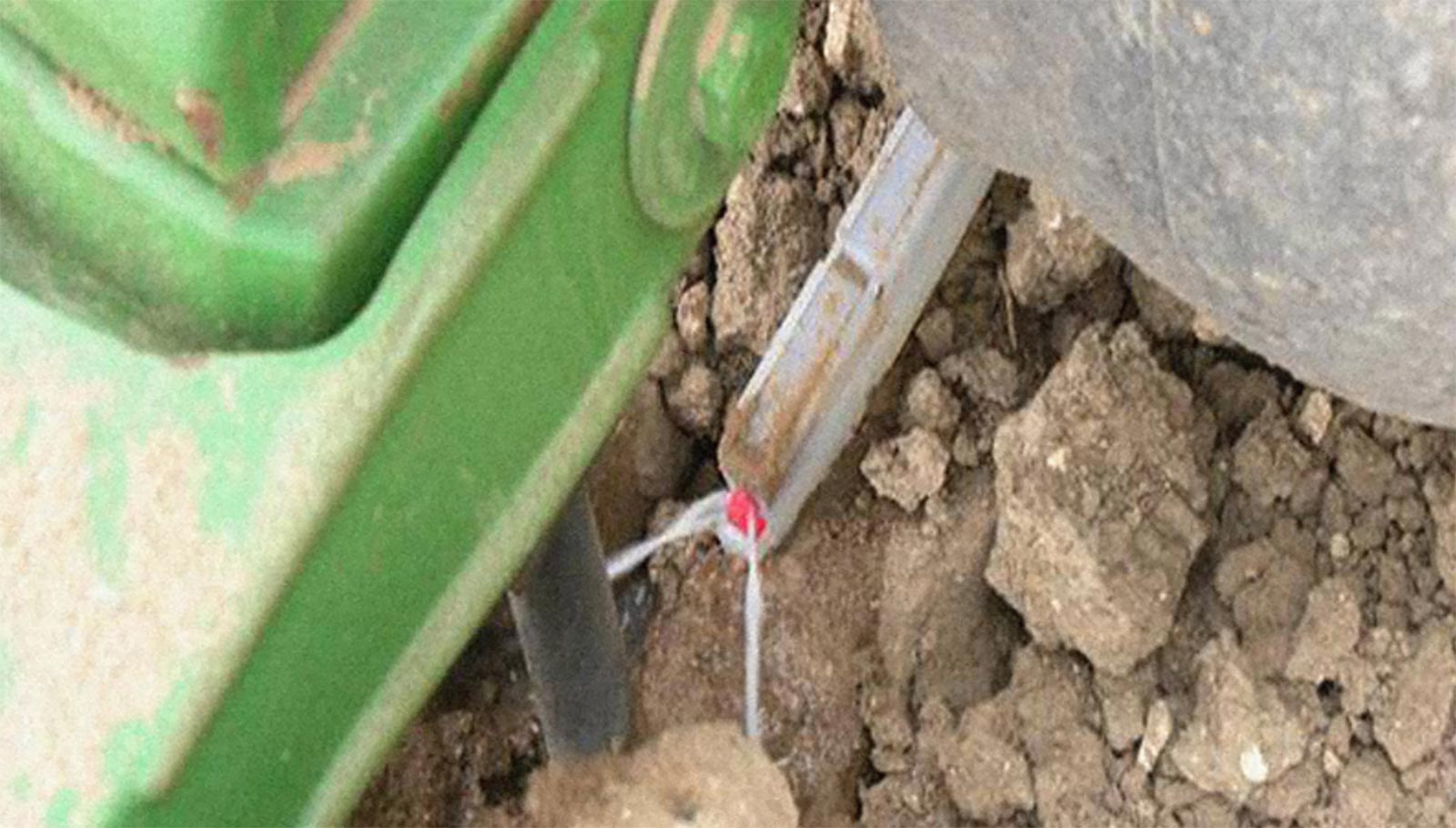 applying in-furrow liquid with the Keeton Seed Firmer