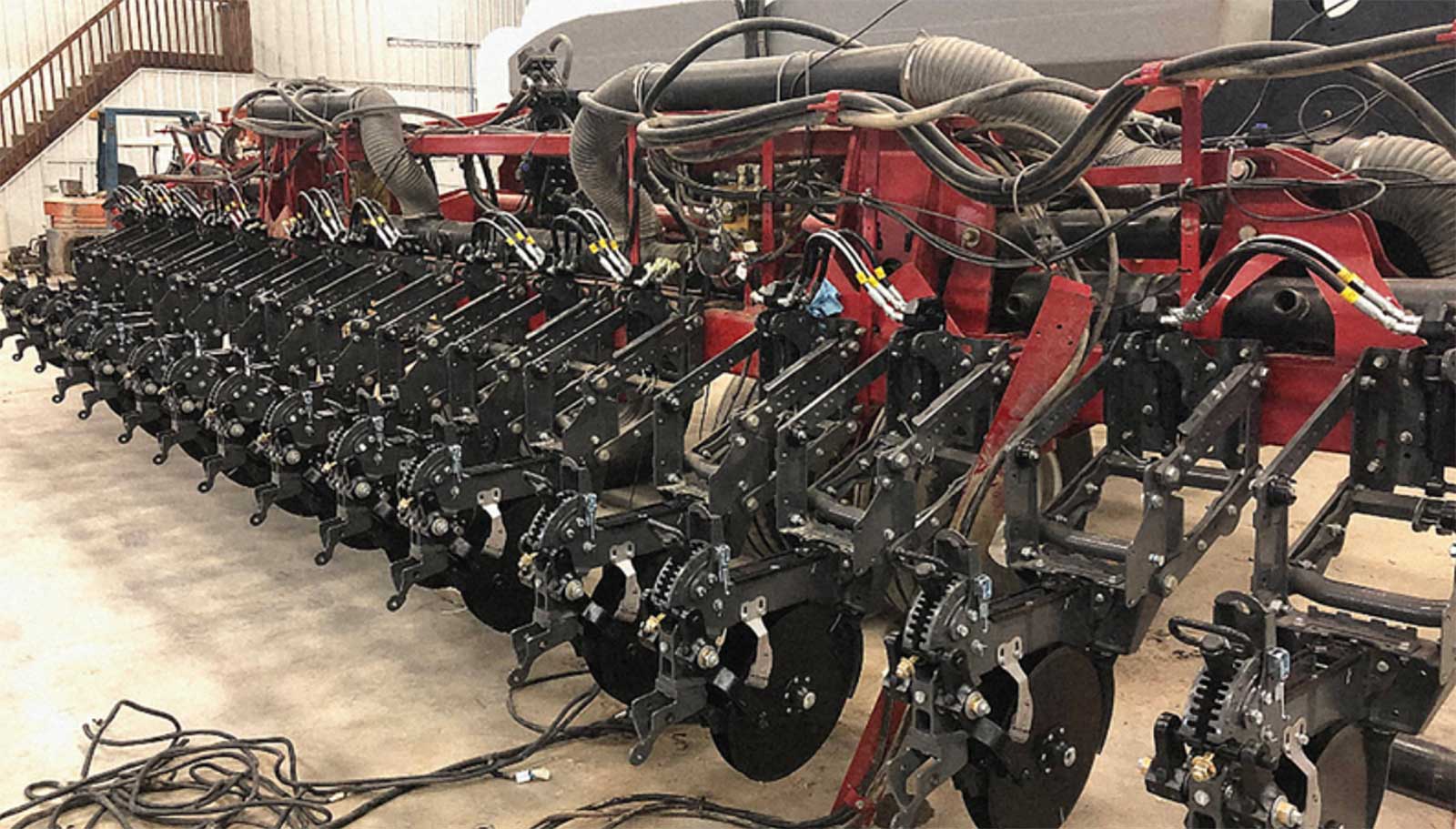 a planter customized with Precision Planting Ready Row Units