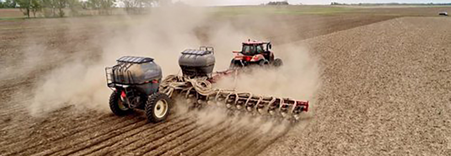 a Harvest International Ultra Max strip till toolbar in action in the field